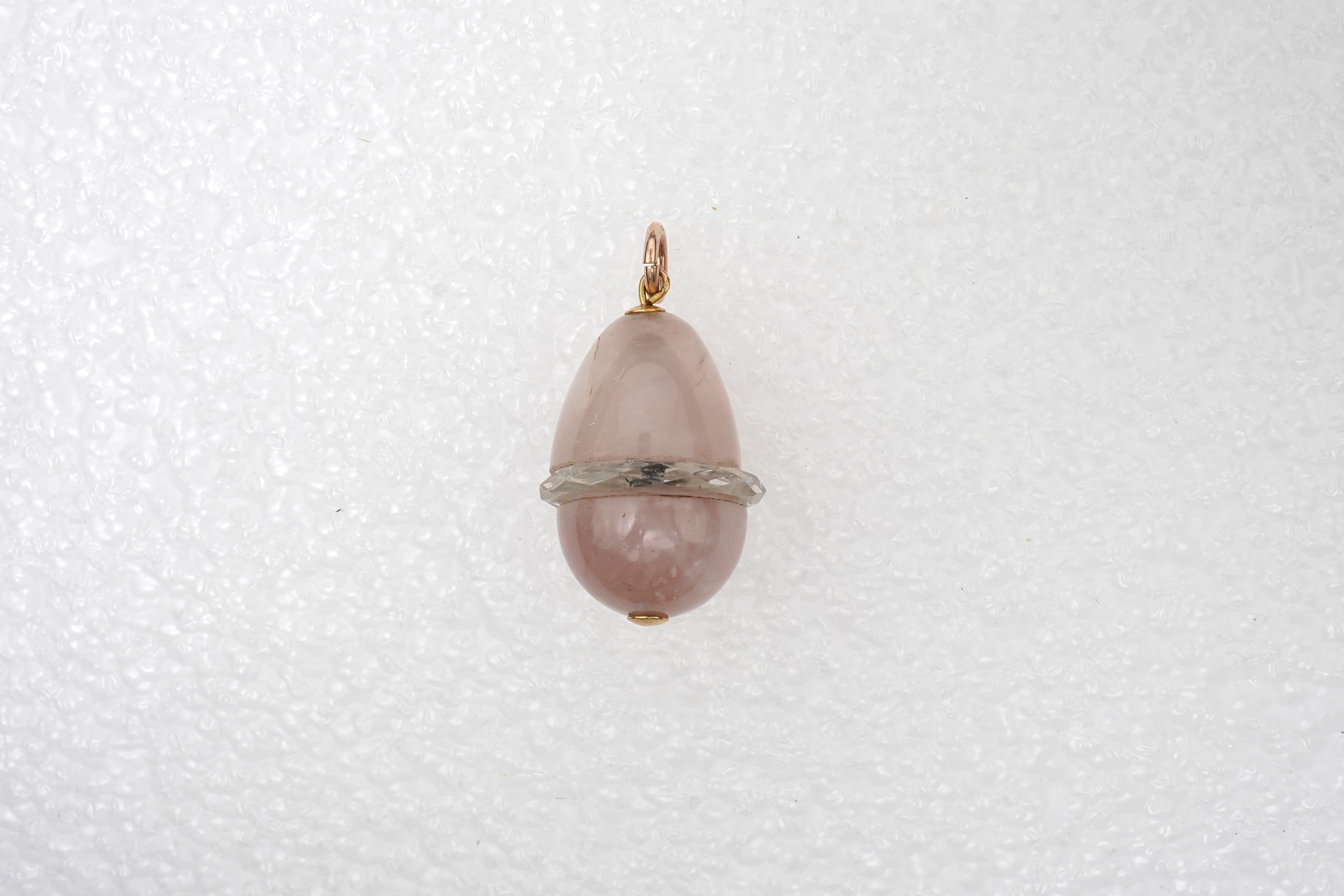 A rose quartz and rock crystal pendant, early 20th century